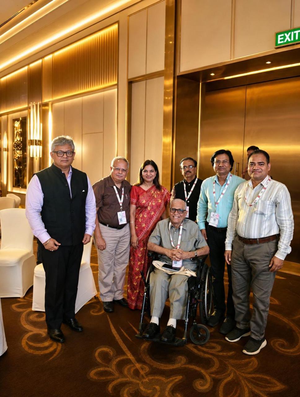 Dr. Ammbulkar with fellow oncologists and Dr. Suresh Advani at the conference